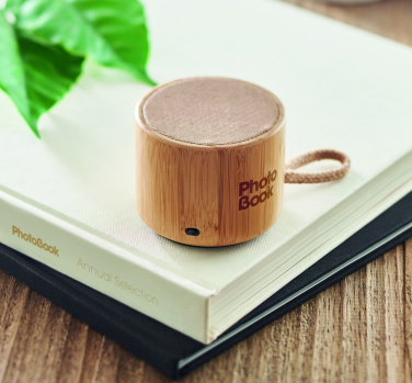 Logotrade corporate gift picture of: Round bamboo wireless speaker